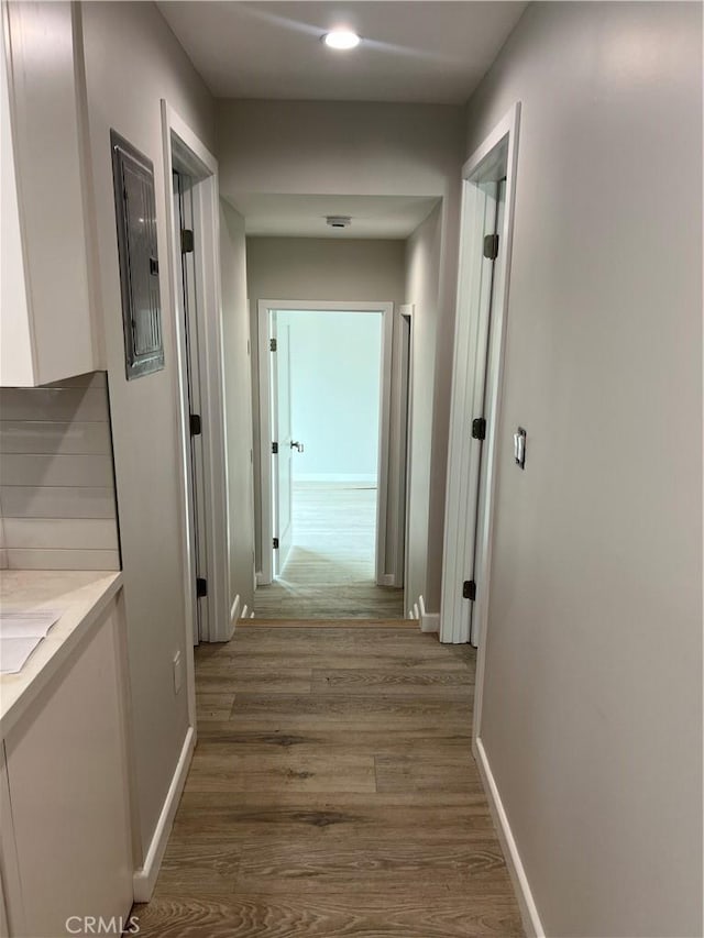 1941 Mentone Ave, Pasadena, CA 91103 - hall with baseboards, wood finished floors, and electric panel