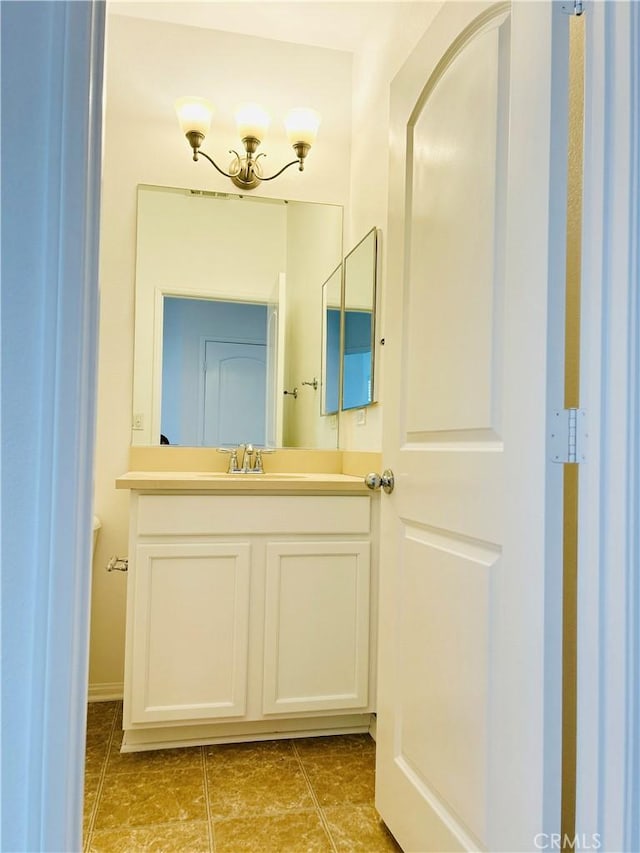 8054 Cresta Bella Rd, Rancho Cucamonga, CA 91730 - bathroom with vanity and tile patterned flooring