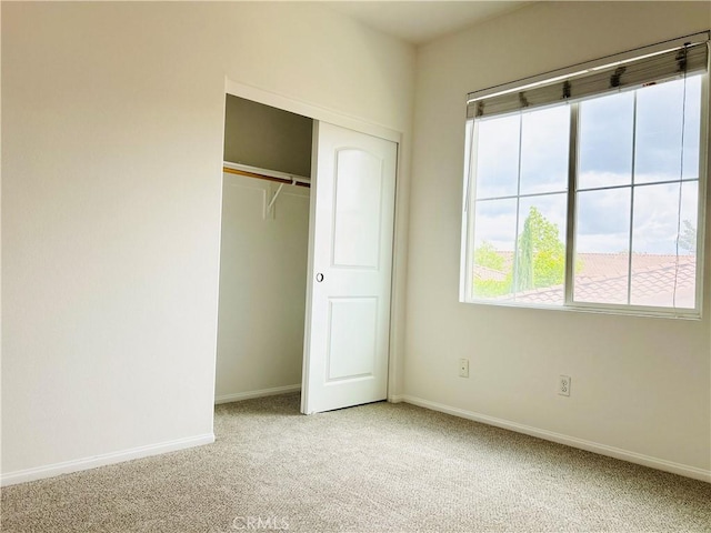 8054 Cresta Bella Rd, Rancho Cucamonga, CA 91730 - unfurnished bedroom featuring carpet floors, baseboards, and a closet