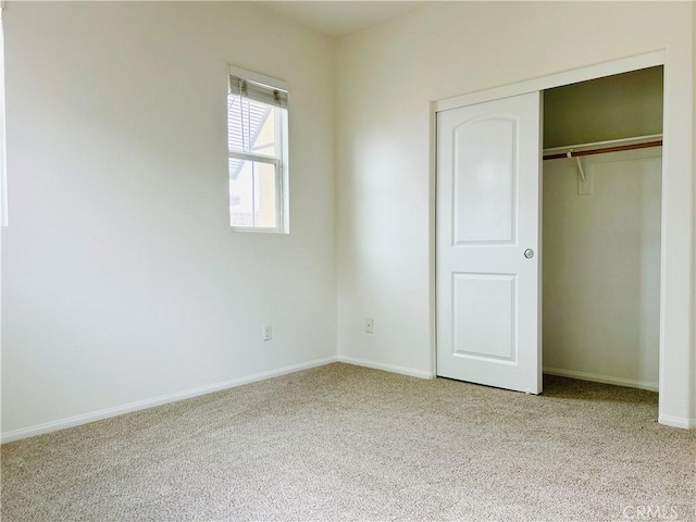 8054 Cresta Bella Rd, Rancho Cucamonga, CA 91730 - unfurnished bedroom with baseboards, carpet, and a closet