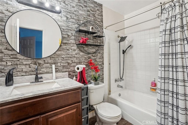 bathroom with vanity, toilet, and shower / tub combo with curtain