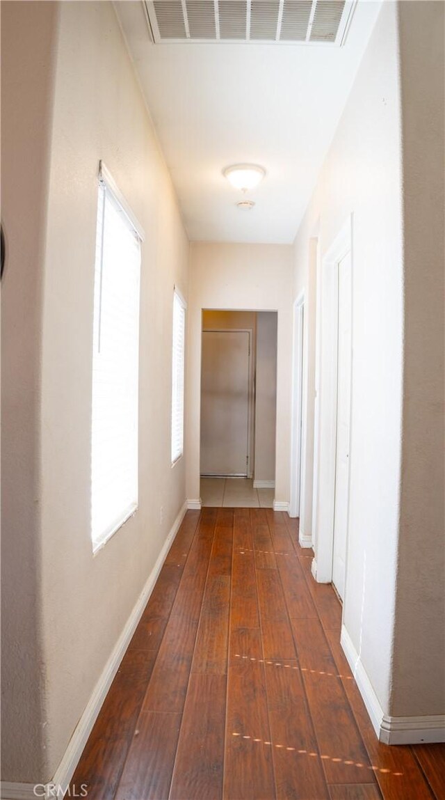 13025 Glendale Pl, Victorville, CA 92392 - hall featuring hardwood / wood-style flooring and baseboards