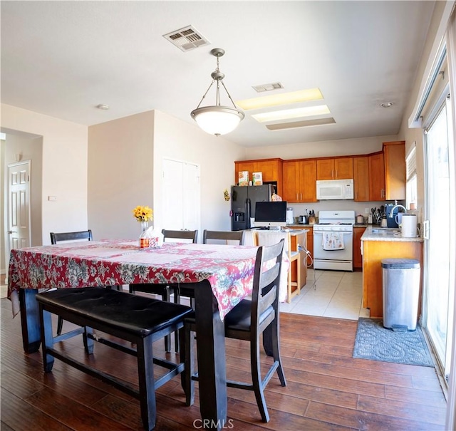 13025 Glendale Pl, Victorville, CA 92392 - dining room featuring hardwood / wood-style floors