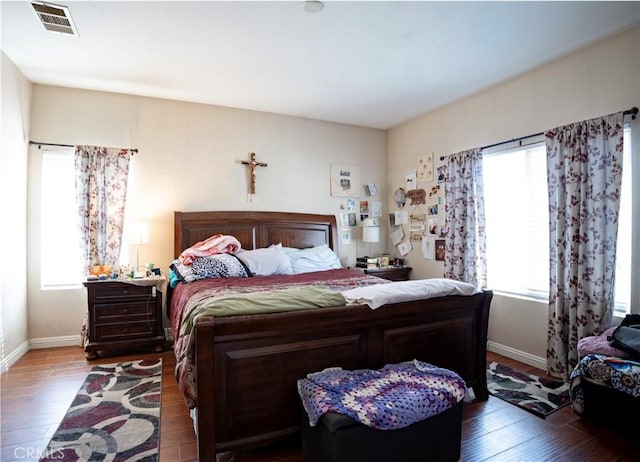 13025 Glendale Pl, Victorville, CA 92392 - bedroom featuring hardwood / wood-style flooring, multiple windows, and baseboards