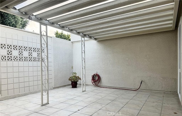 view of patio / terrace featuring fence