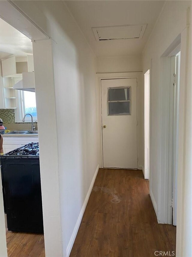 4772 Dwight St Unit 4770, San Diego, CA 92105 - hallway featuring a sink and wood finished floors