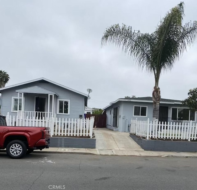 4772 Dwight St Unit 4770, San Diego, CA 92105 - view of front facade featuring a fenced front yard