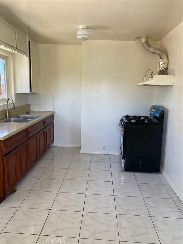 4772 Dwight St Unit 4770, San Diego, CA 92105 - kitchen with black gas stove and light countertops