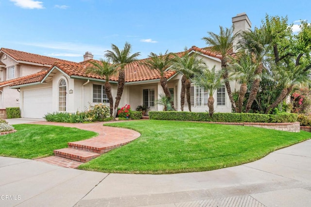 1144 Oriole Cir, Fillmore, CA 93015 - mediterranean / spanish-style house with stucco siding, a chimney, a garage, and a front lawn
