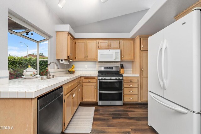 1144 Oriole Cir, Fillmore, CA 93015 - kitchen with white appliances, dark wood-type flooring, lofted ceiling, tile countertops, and tasteful backsplash