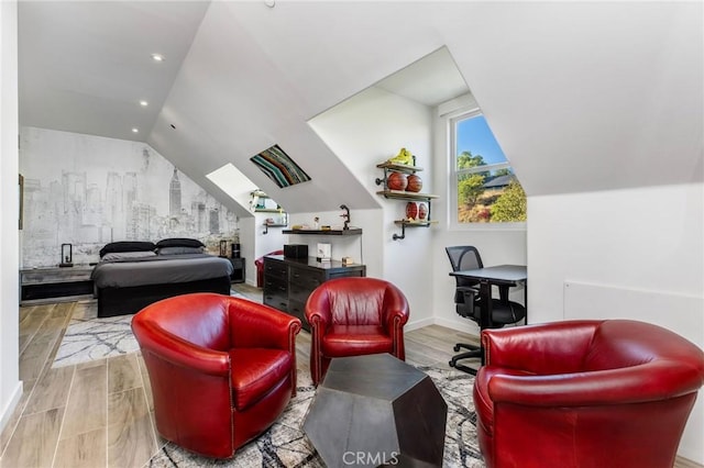 living area featuring baseboards, recessed lighting, wood finished floors, and lofted ceiling