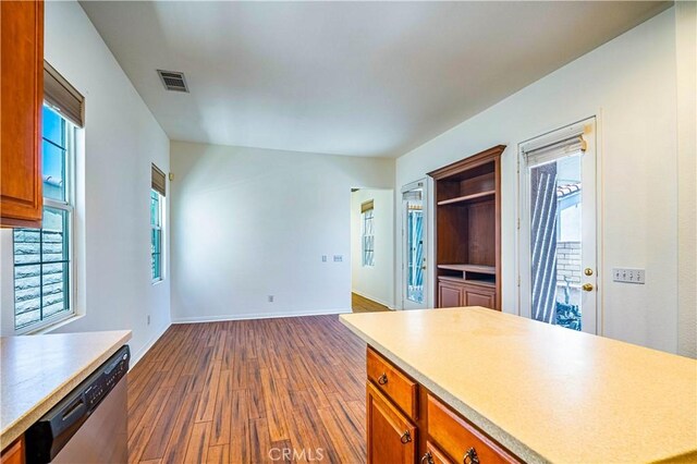67960 Rio Vista Dr, Cathedral City, CA 92234 - kitchen featuring dark wood finished floors, visible vents, dishwasher, and plenty of natural light