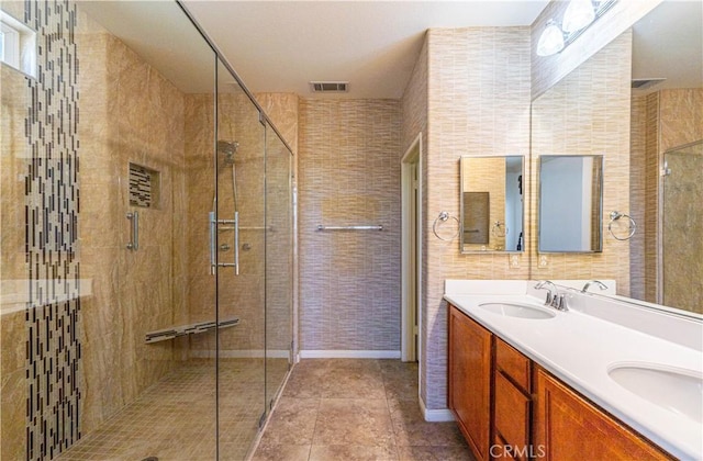 67960 Rio Vista Dr, Cathedral City, CA 92234 - bathroom featuring visible vents, a shower stall, and a sink