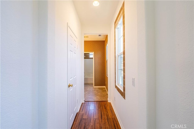 67960 Rio Vista Dr, Cathedral City, CA 92234 - hallway with baseboards and dark wood-type flooring