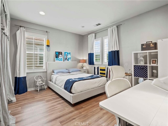 22458 Plantation Ct, Saugus, CA 91350 - bedroom featuring visible vents, wood finished floors, baseboards, and recessed lighting