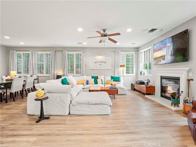22458 Plantation Ct, Saugus, CA 91350 - living area with light wood finished floors, visible vents, ceiling fan, and recessed lighting
