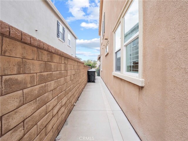22458 Plantation Ct, Saugus, CA 91350 - view of side of home with fence and stucco siding