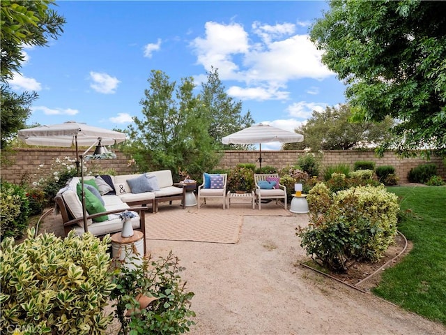 22458 Plantation Ct, Saugus, CA 91350 - view of patio / terrace with a fenced backyard and an outdoor hangout area