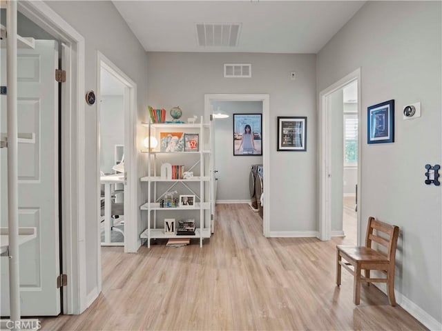 22458 Plantation Ct, Saugus, CA 91350 - hall featuring baseboards, visible vents, and wood finished floors