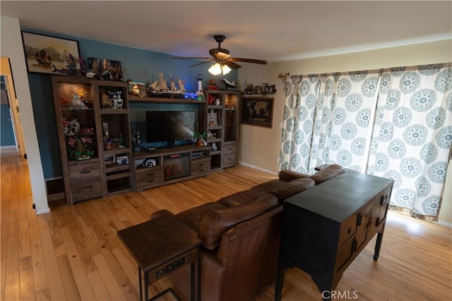 8491 Oak Glen Rd, Cherry Valley, CA 92223 - living room with ceiling fan, hardwood / wood-style floors, and baseboards
