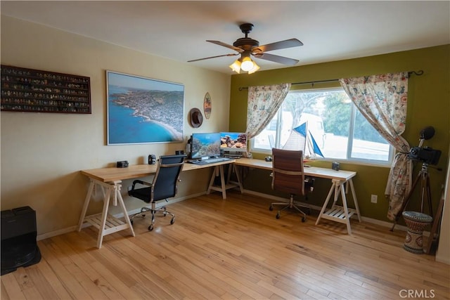 8491 Oak Glen Rd, Cherry Valley, CA 92223 - home office with hardwood / wood-style flooring, ceiling fan, and baseboards