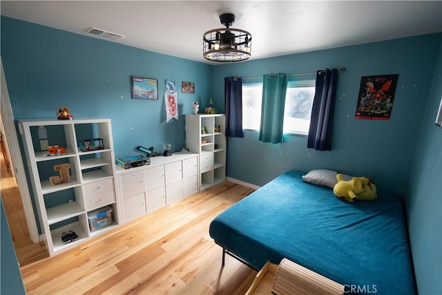 8491 Oak Glen Rd, Cherry Valley, CA 92223 - bedroom with wood finished floors