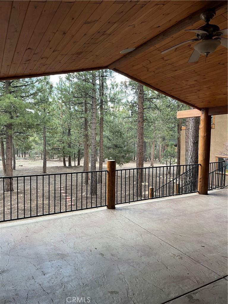 view of patio / terrace featuring ceiling fan