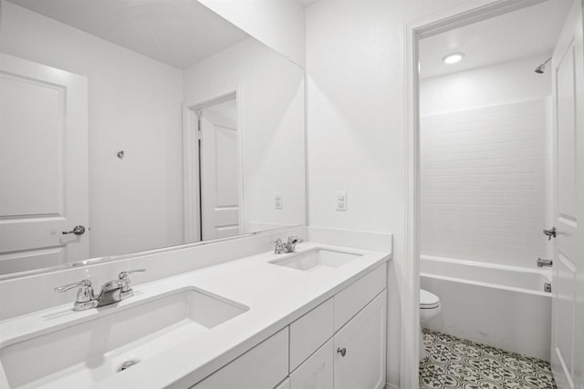 835 Orangedale Ave, Redlands, CA 92374 - bathroom with toilet, double vanity, a sink, and tile patterned flooring