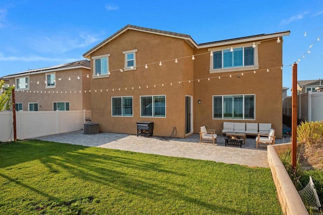 835 Orangedale Ave, Redlands, CA 92374 - back of house with a patio, a yard, stucco siding, and an outdoor living space with a fire pit