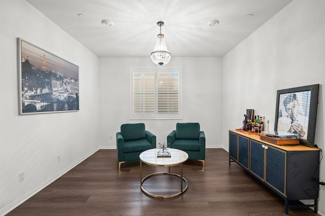 835 Orangedale Ave, Redlands, CA 92374 - living area with wood finished floors, a notable chandelier, and baseboards