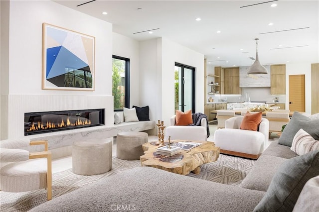 482 Costa Mesa St, Costa Mesa, CA 92627 - living area featuring a glass covered fireplace and recessed lighting