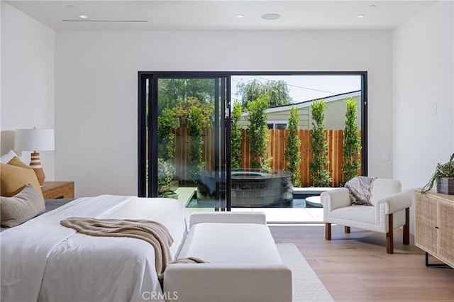 482 Costa Mesa St, Costa Mesa, CA 92627 - bedroom with light wood-style floors and recessed lighting