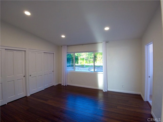 1446 Via Castilla, Palos Verdes Estates, CA 90274 - unfurnished bedroom with wood finished floors, baseboards, recessed lighting, multiple closets, and lofted ceiling