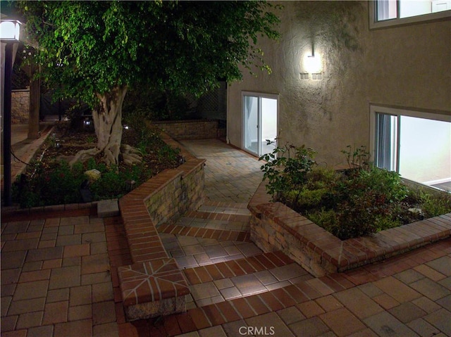1446 Via Castilla, Palos Verdes Estates, CA 90274 - view of exterior entry with stucco siding and a patio