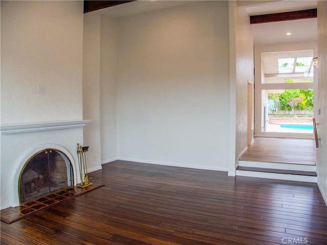 1446 Via Castilla, Palos Verdes Estates, CA 90274 - unfurnished living room with wood-type flooring, a tile fireplace, and baseboards