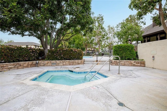 view of swimming pool featuring a patio area and a swimming pool