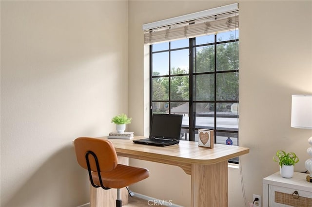 office featuring baseboards