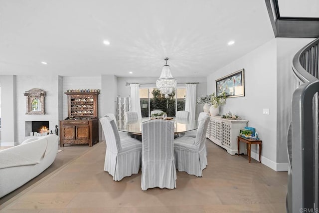 14 Buccaneer Way, Coronado, CA 92118 - dining space with baseboards, recessed lighting, a chandelier, and a fireplace