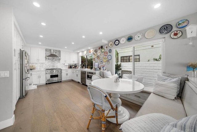 14 Buccaneer Way, Coronado, CA 92118 - dining space with recessed lighting and light wood finished floors