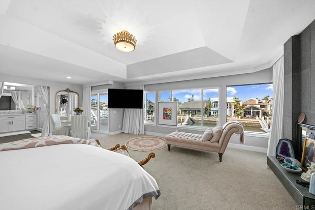 14 Buccaneer Way, Coronado, CA 92118 - carpeted bedroom with baseboards, access to outside, and a tray ceiling