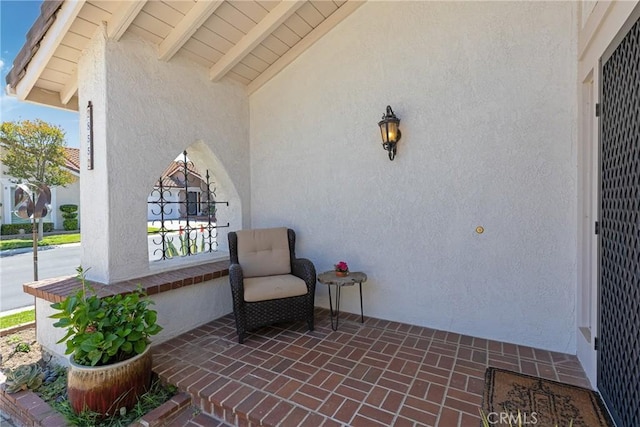 view of patio featuring covered porch