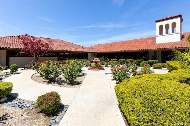 view of front of home with a tile roof