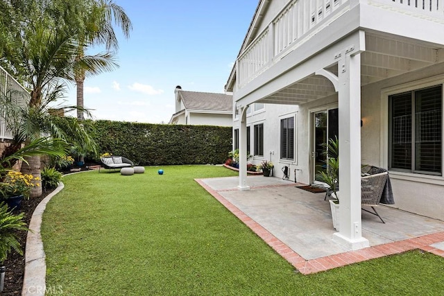 view of yard with a fenced backyard and a patio area