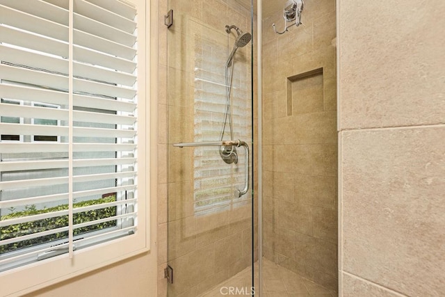 bathroom with a stall shower