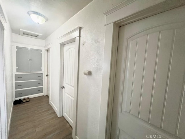 583 W G St, Colton, CA 92324 - hallway with baseboards, attic access, wood finished floors, and visible vents