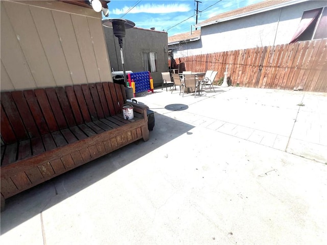 583 W G St, Colton, CA 92324 - view of patio with fence and outdoor dining area
