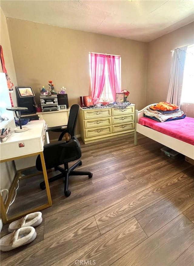 583 W G St, Colton, CA 92324 - bedroom with dark wood-style floors