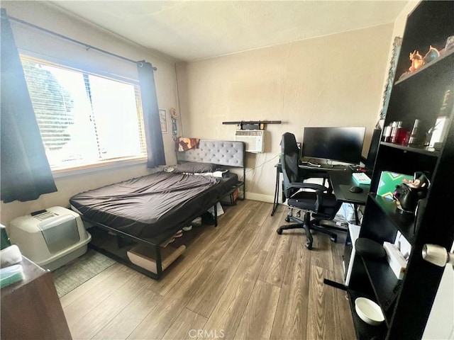 583 W G St, Colton, CA 92324 - bedroom with baseboards and wood finished floors