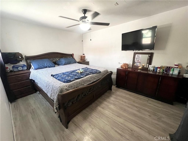583 W G St, Colton, CA 92324 - bedroom with ceiling fan and light wood-type flooring