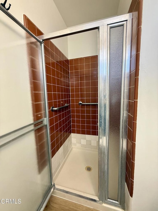 bathroom with a stall shower